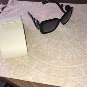 Prada sunglasses. Purchased 2014.